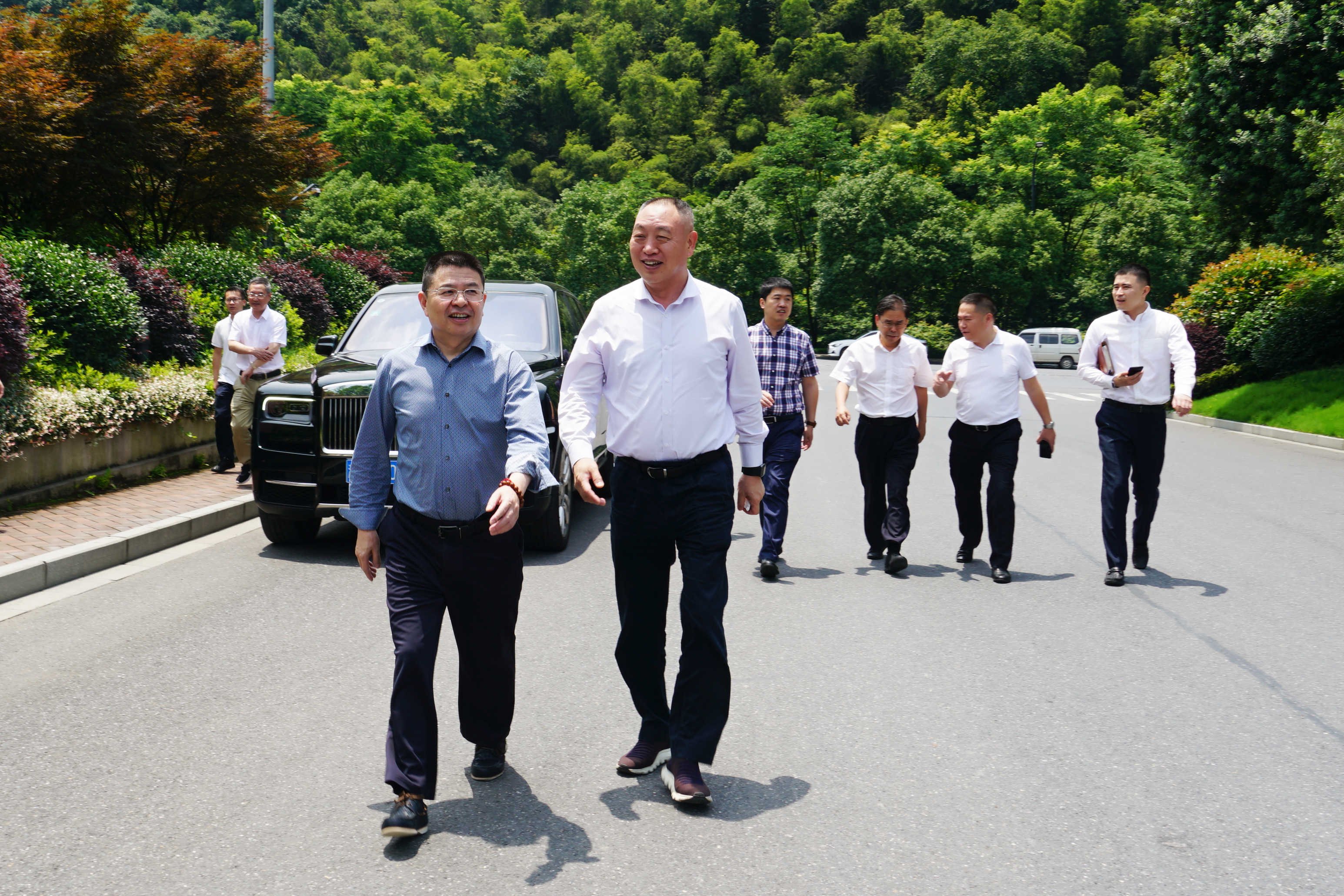 中国邮政储蓄银行浙江省分行行长徐维进走访总总.JPG